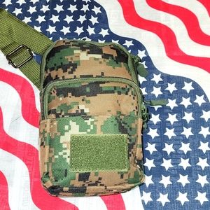 Camouflage canvas phone holder and more. Has a shoulder strap.